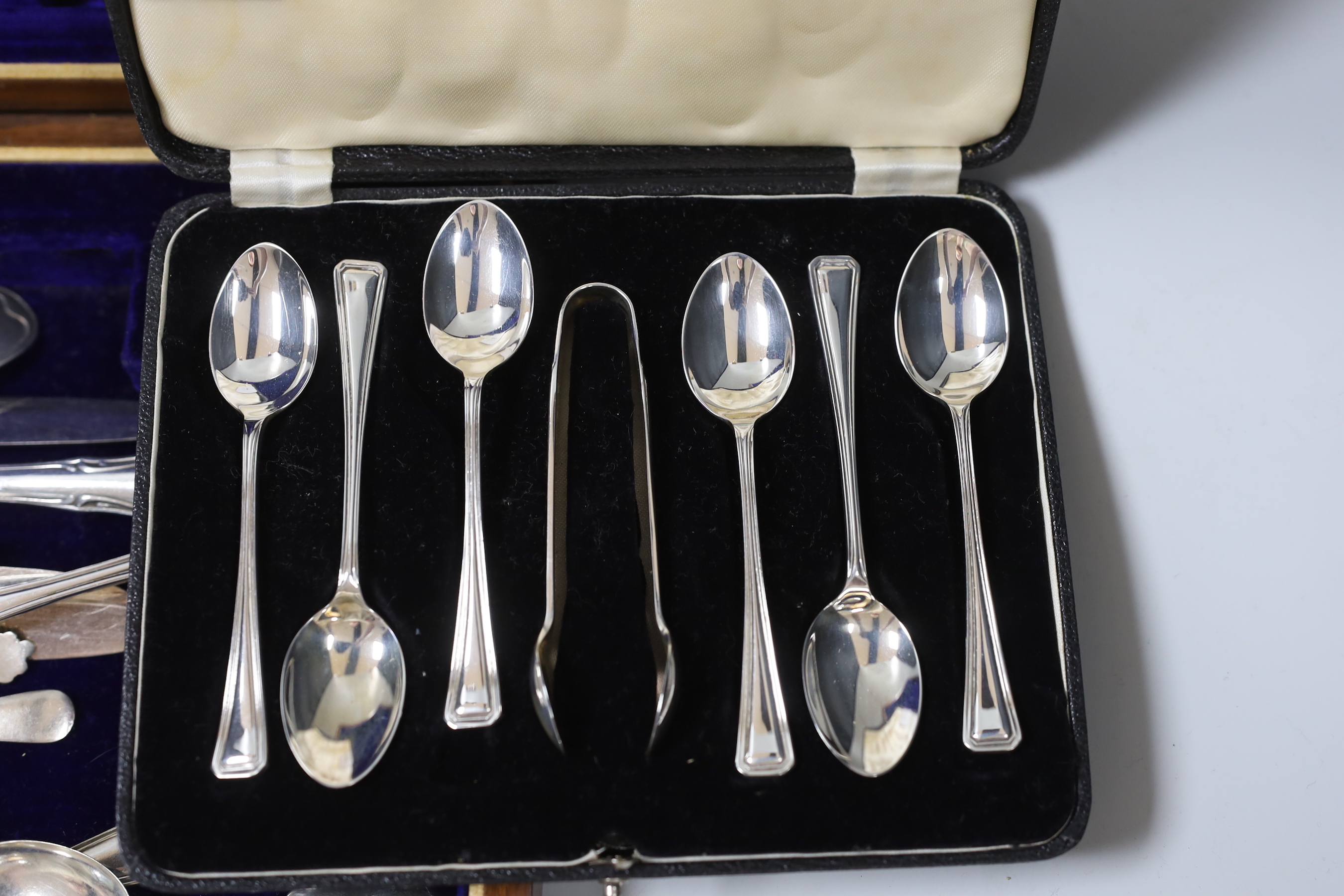 A cased set of six Norwegian 925S and enamelled coffee spoons, a cased set of six silver teaspoons and other assorted flatware including white metal.